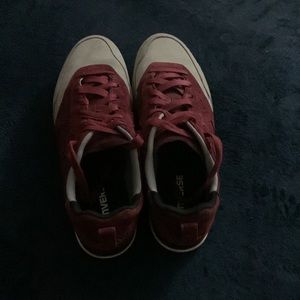 Gray and burgundy converse shoes